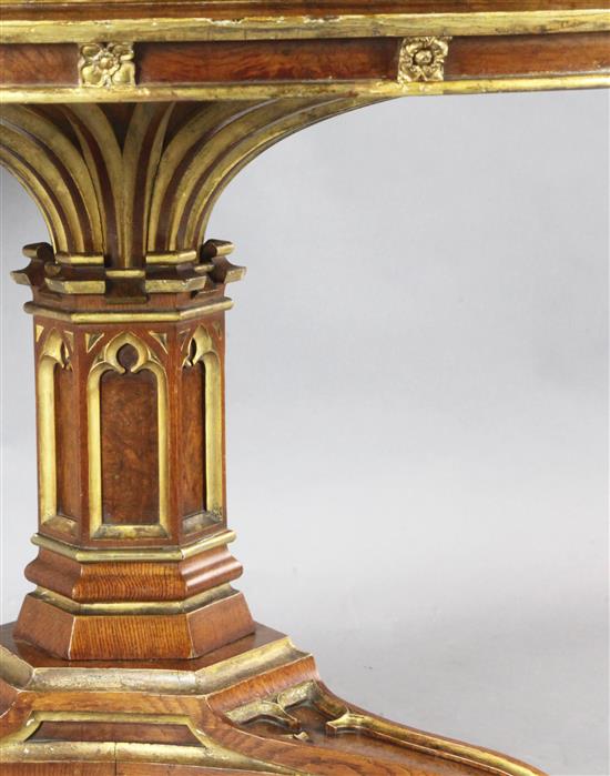 A.W.N. Pugin for Morel & Seddon. An important Gothic revival oak, pollard oak, parcel gilt marquetry centre table, Diam. 4ft 2in. H.2ft